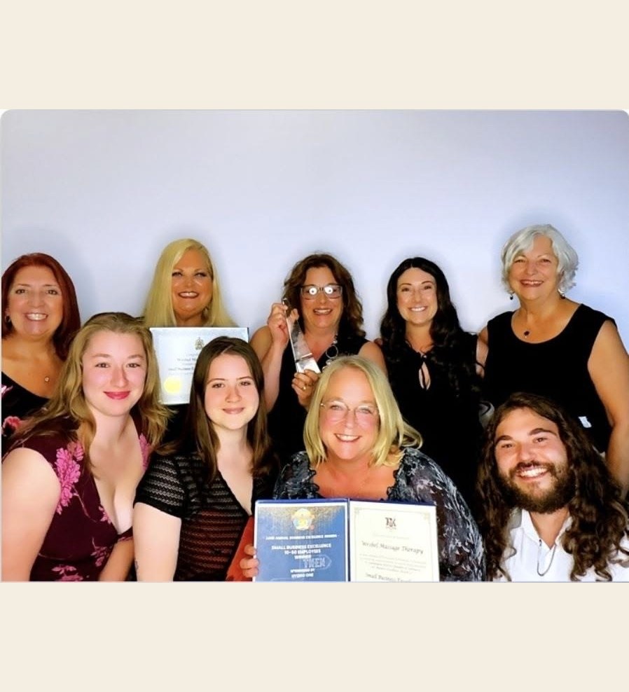 Wrobel Massage Therapy team accepting the 2026 Leamington Chamber of Commerce Small Business Excellence Award