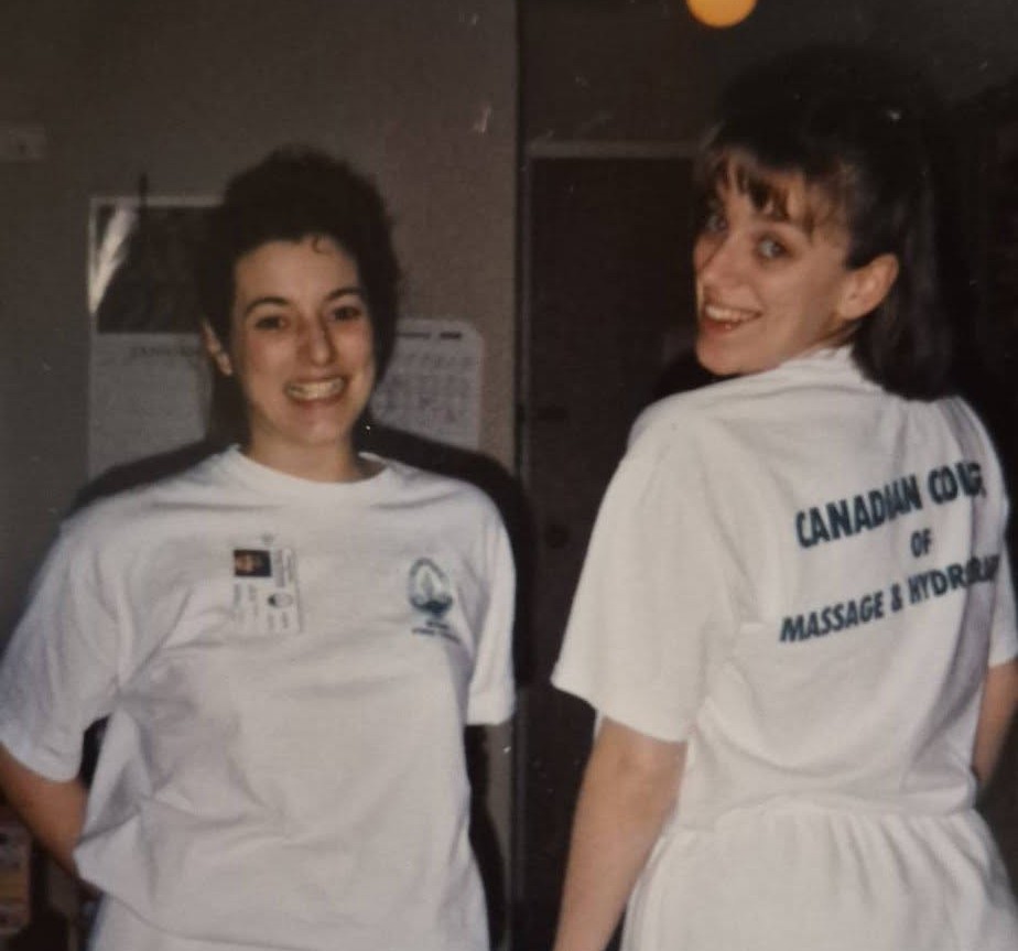 Melissa (Cieslar) Wrobel and Sharon (Herridge) Parsons preparing for student clinic at the Canadian College of Massage and Hydrotherapy in 1995