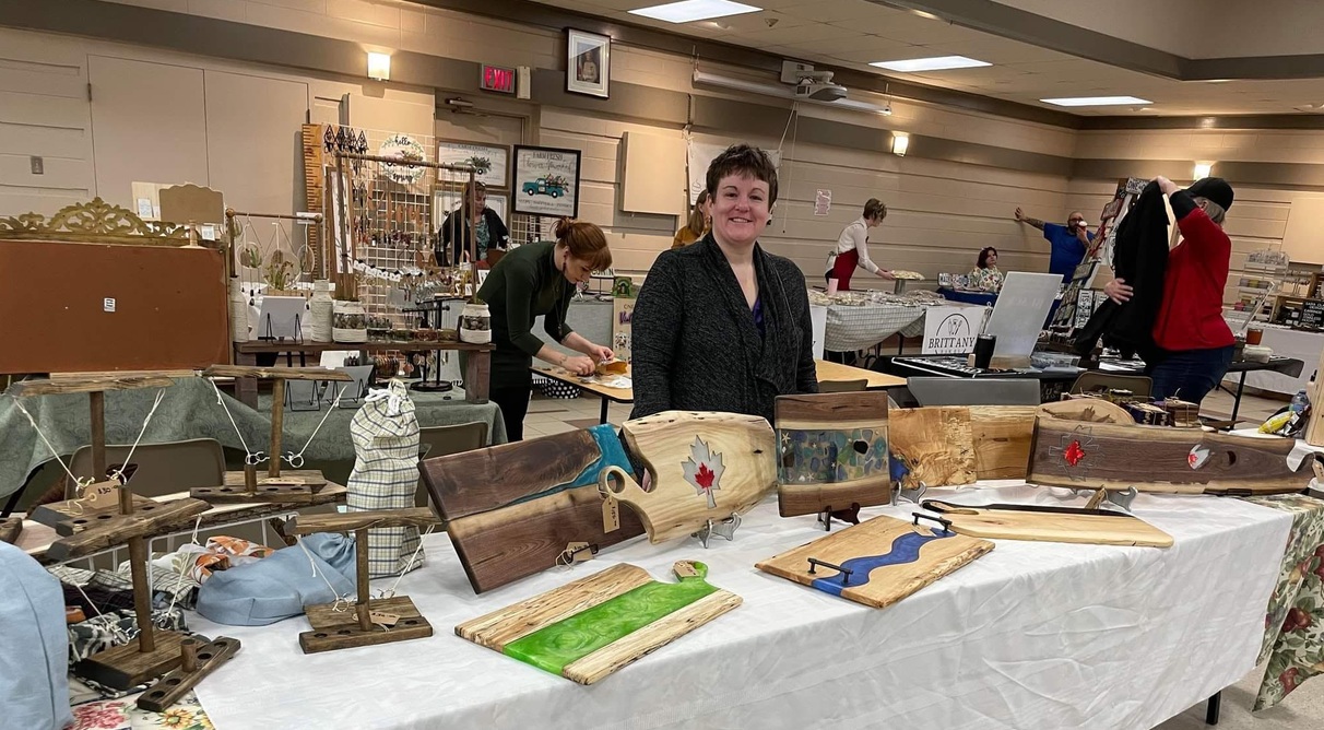 Handcrafted charcuterie board by Trish Harris, Kismet Woodworking, on display at Wrobel Massage Therapy